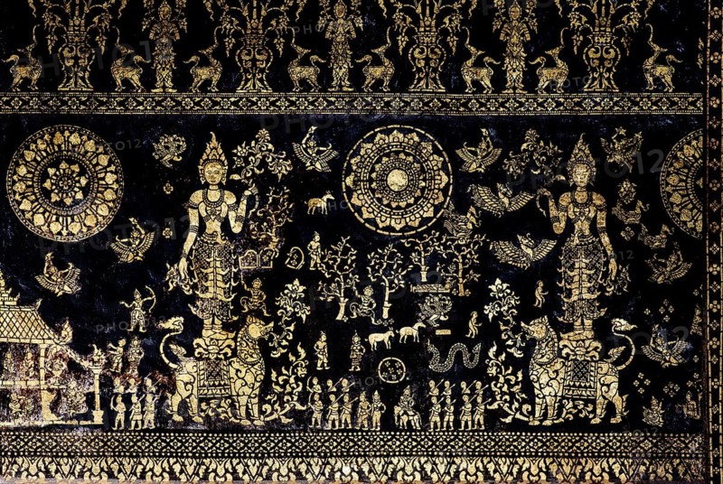Exterior wall of the Sim prayer hall with gilded images of Apsaras
