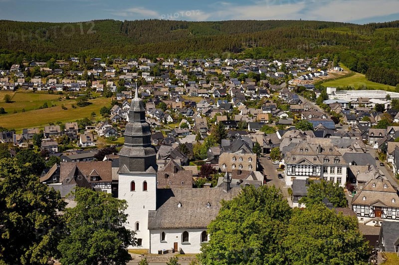 Saint John the Evangelist Church with village view