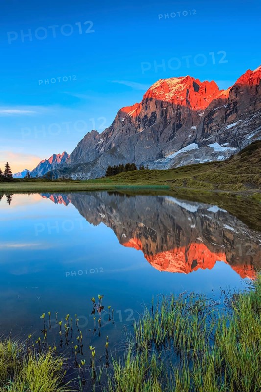 Wellhorn and Engelhoerner with mountain lake