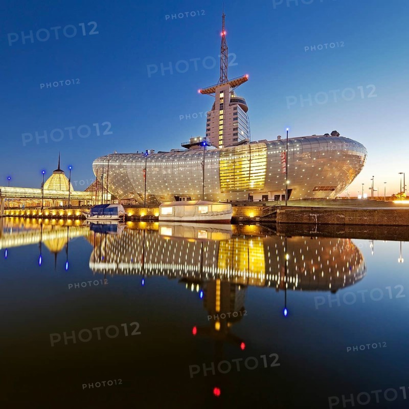 Illuminated Klimahaus Bremerhaven in the evening