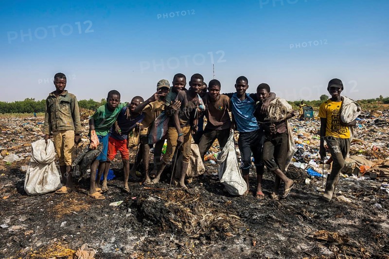 Local boys posing on a dump