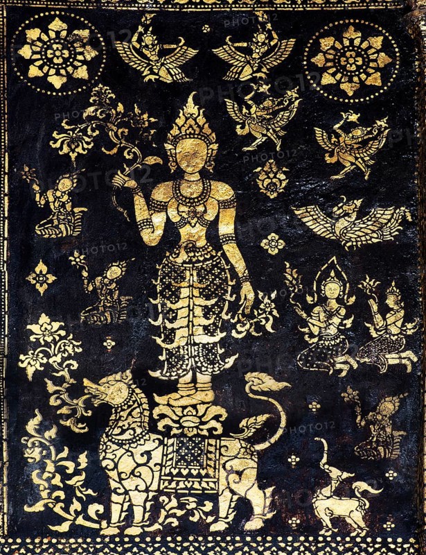 Decorated outer wall of the Sim prayer hall with gilded images of Apsaras