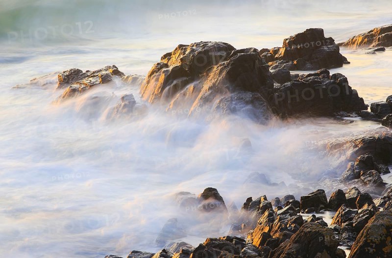 Rocks and waves on the sea coast near Bamburgh