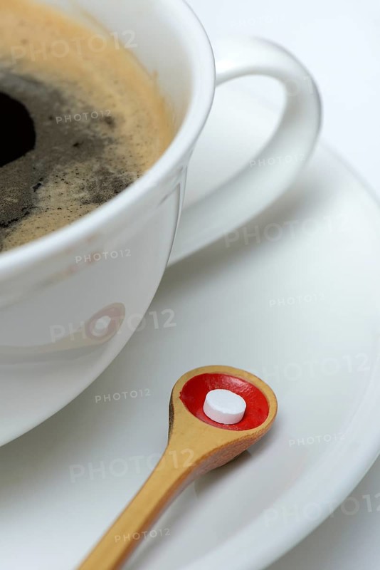Sweetener tablet and coffee cup