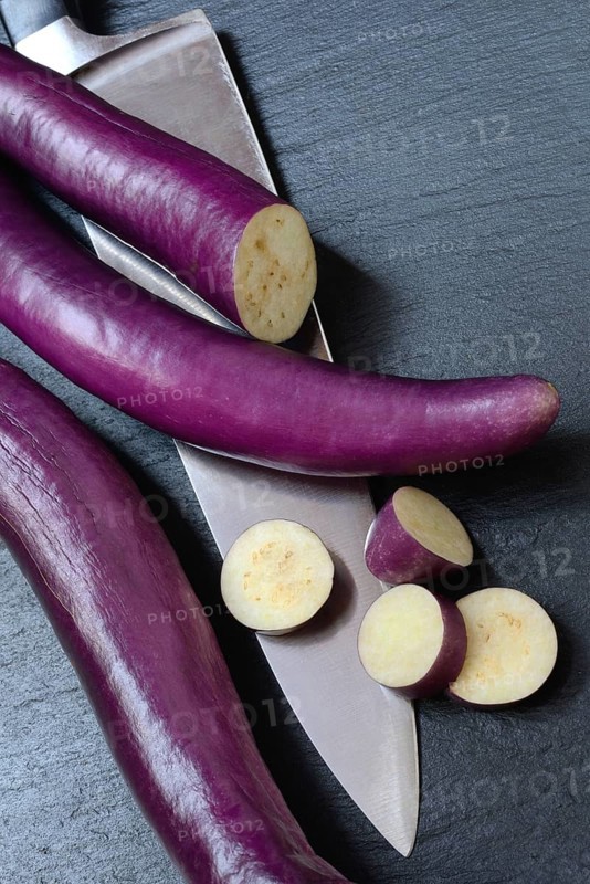 Japanese eggplant with knife