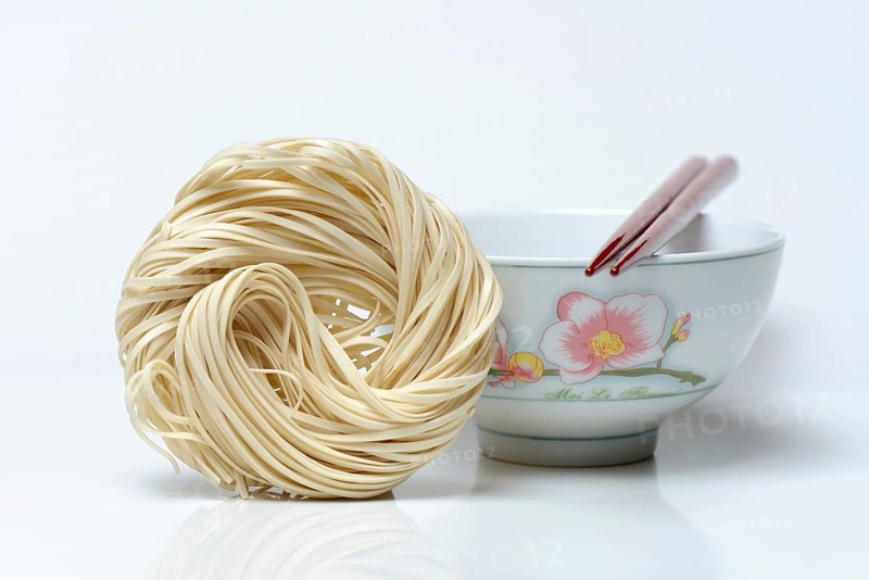Chinese noodles and bowl with chopsticks