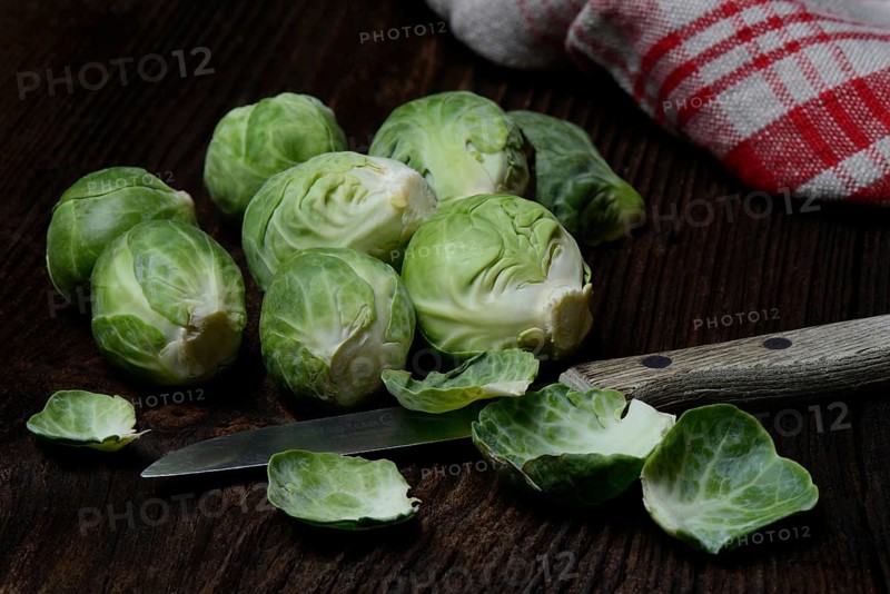 Brussels sprouts with kitchen knife