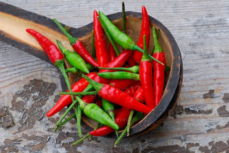 Peppers in wooden shovel