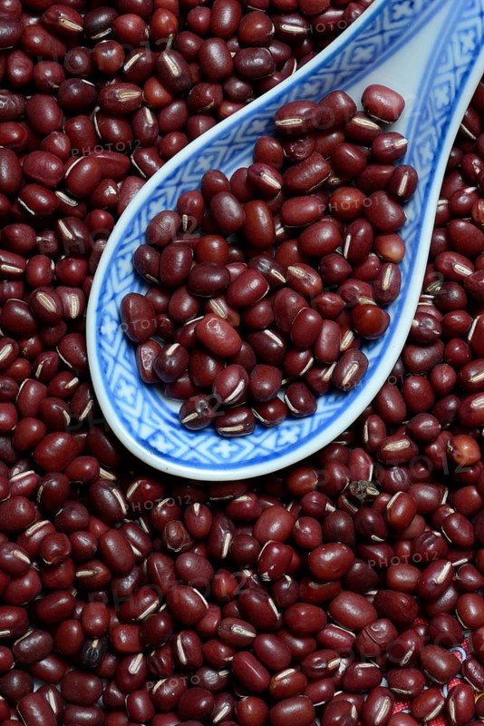 Dried azuki beans with porcelain spoon