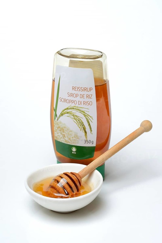 Rice syrup in bottle and bowl