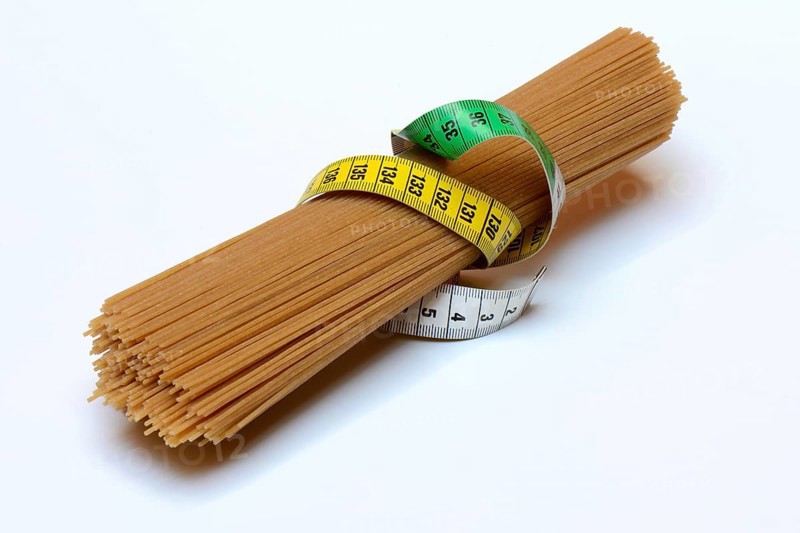 Spaghettis with measuring tape