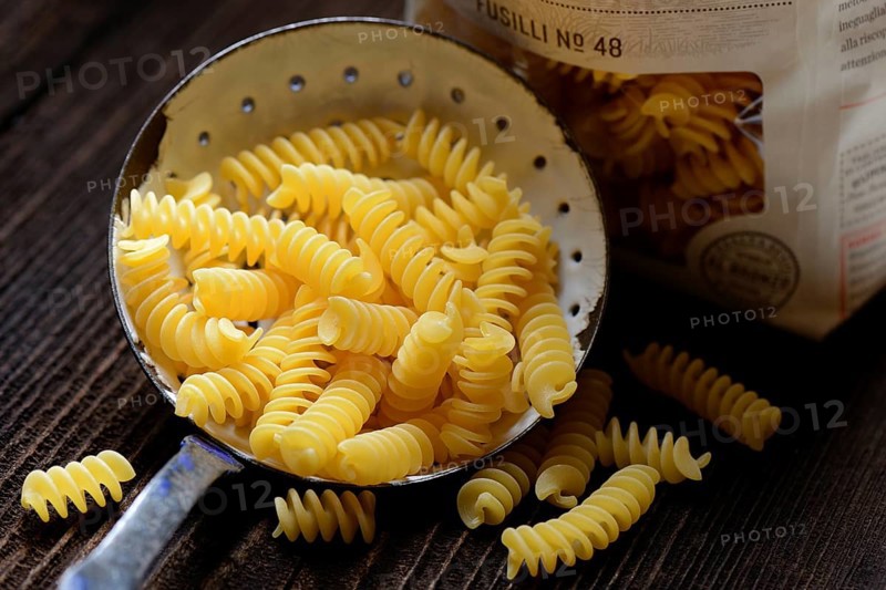 Spiral noodles in sieve ladle