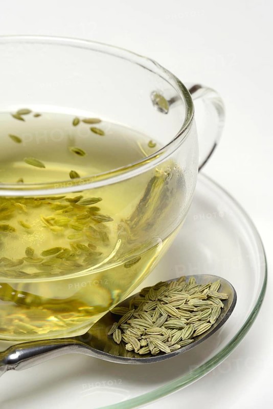 Fennel tea in cup and fennel seeds in spoon