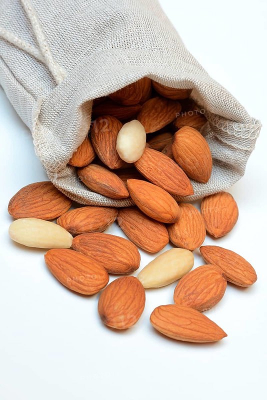 Sweet almonds in linen bags