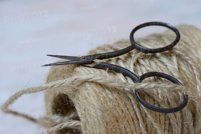 Roll of jute string and scissors
