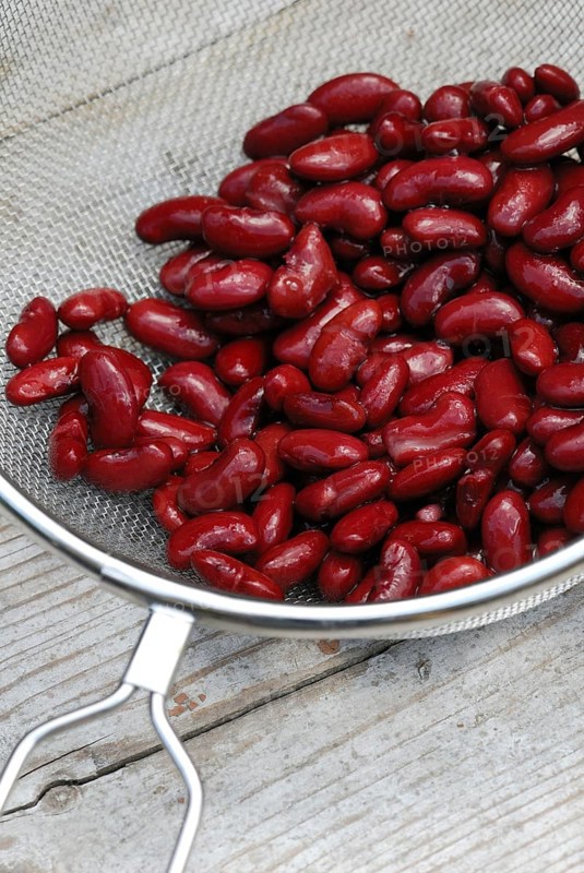 Red kidney beans in sieve