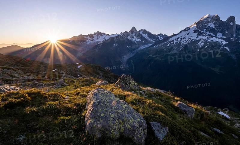 Sun shines over mountains