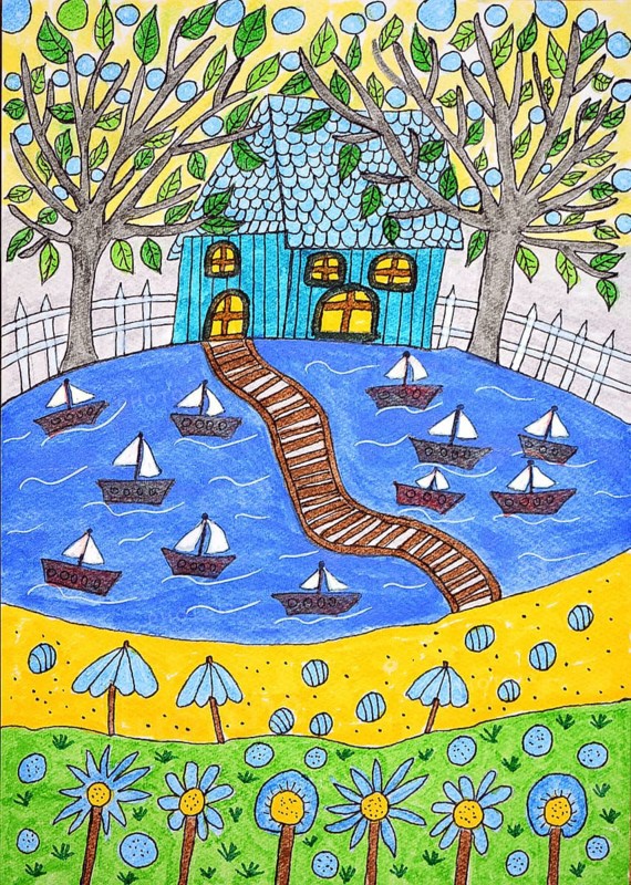 Blue house in the green at the lake