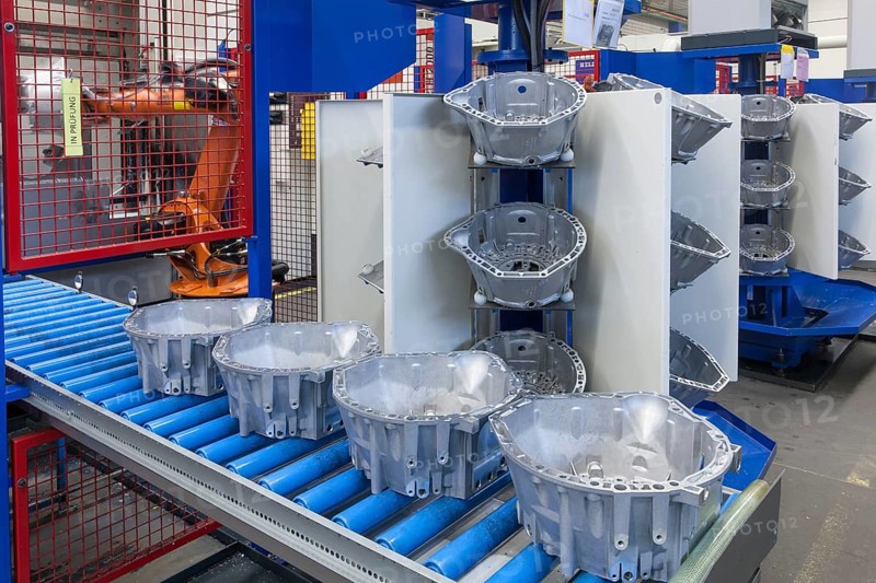 Car parts on a conveyor belt in a car parts factory