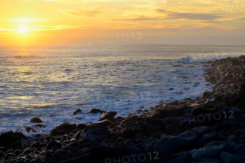 Sunset with clouds over the Pacific Ocean