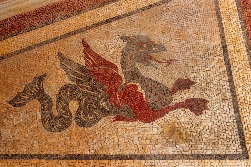Mythical animals decorating walls in Estoi Palace garden
