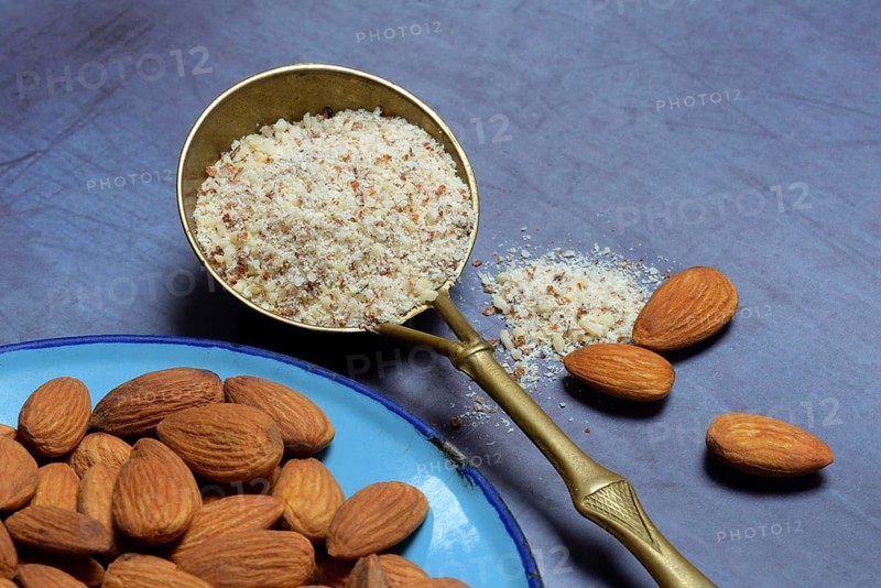 Ground almonds in ladle