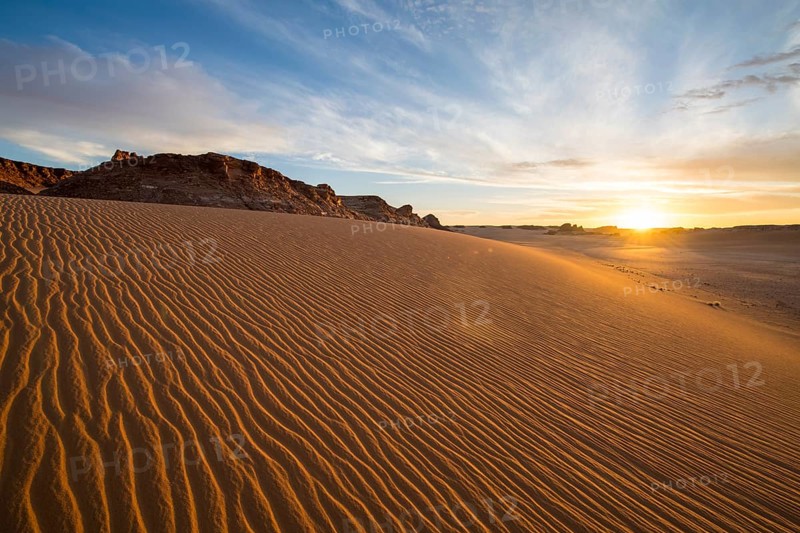 Sanddunes at sunset near the UNesco sight Ounianga lakes