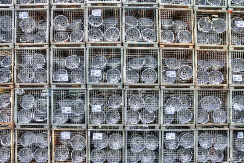 Car parts in the pallet cage in the warehouse