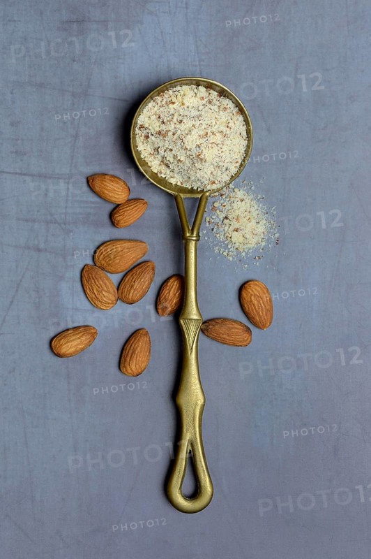 Ground almonds in ladle