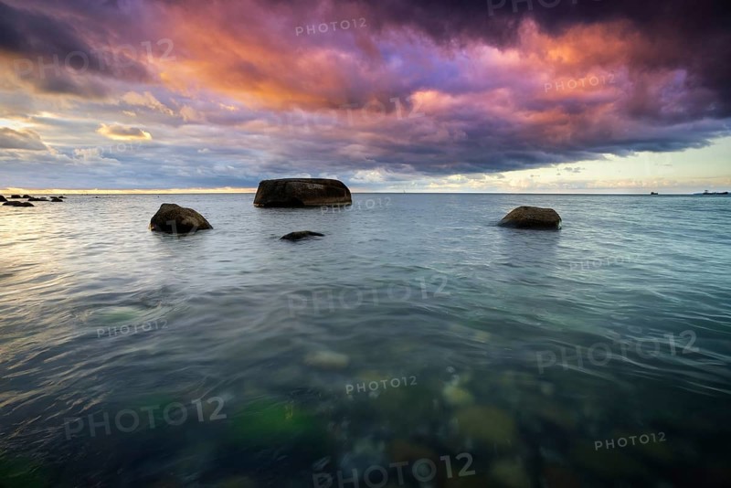 Dramatic clouds at sunrise at the Baltic Sea