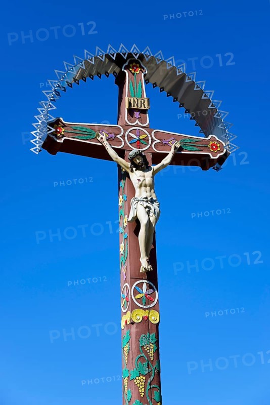 Typical colourful wooden cross at the cemetery