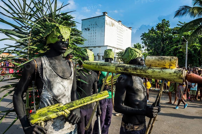 Martial looking weapons made of bamboo at the Carneval in the town of Sao Tome