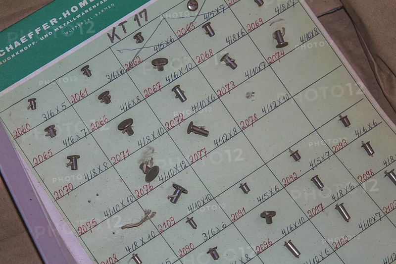 Old sheet with patterns of different rivets