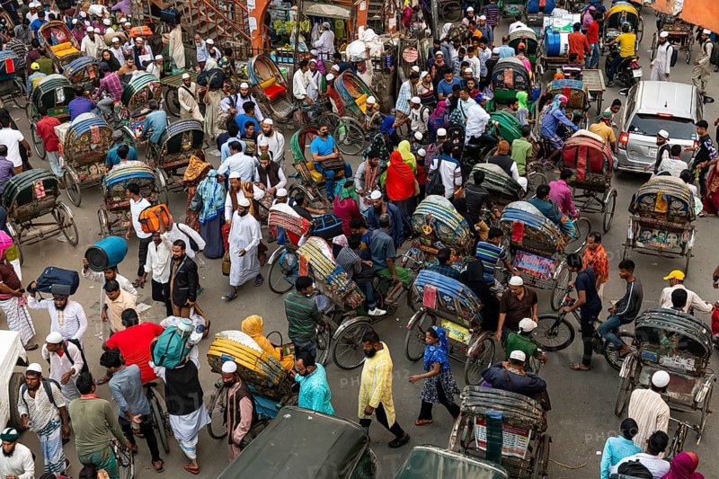 Completely with rickshaws overcrowded street in the center of Dhaka