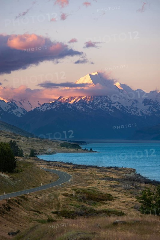 View of Mount Cook with road and lake