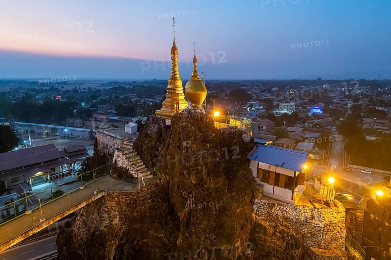 Taung Kew Paya built on rocks after sunset