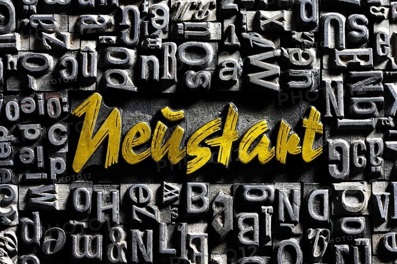 Old lead letters with golden writing