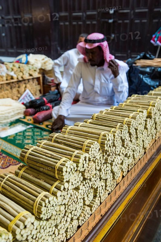 Man selling chewing sticks