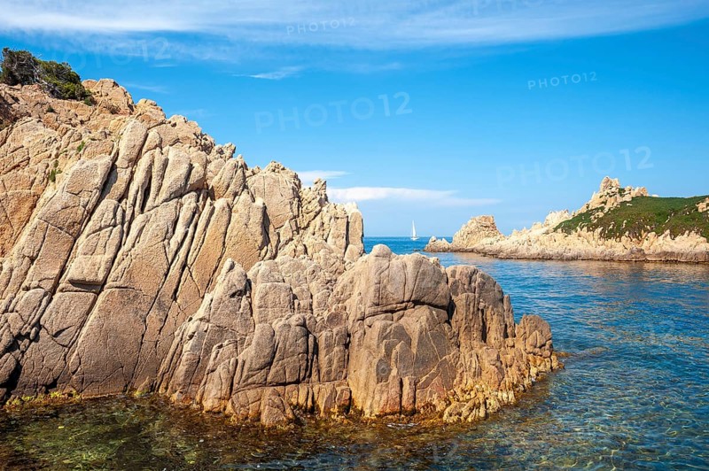 Rocky coast at Cap Camarat with the island Rocher des Portes