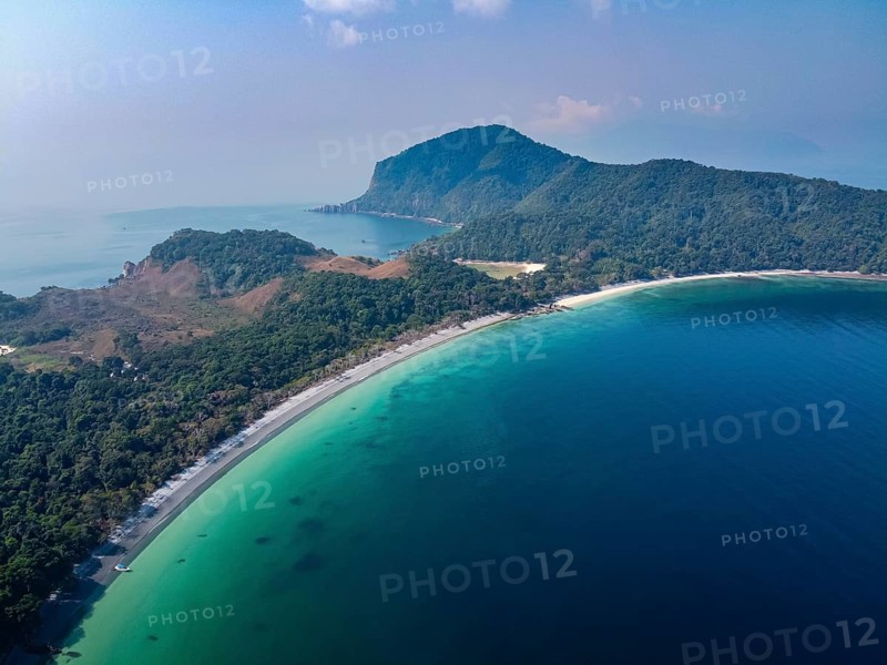 Aerial of a white sand beach on smart island