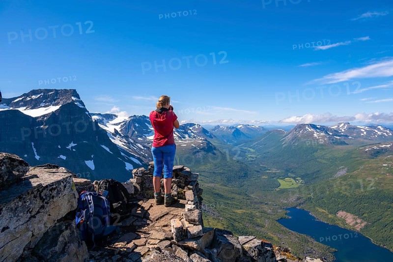 Hiking at the peak of Innerdalstarnet