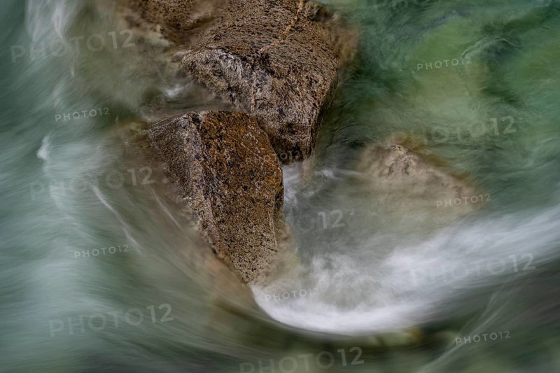 Water flowing over stones