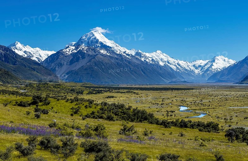 View of Mount Cook and snow covered mountains with Tasman River