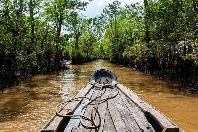 Rowing through a small water channel