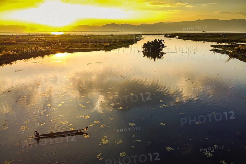 Rowing boat at sunset