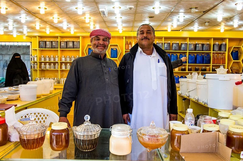 Men selling honey