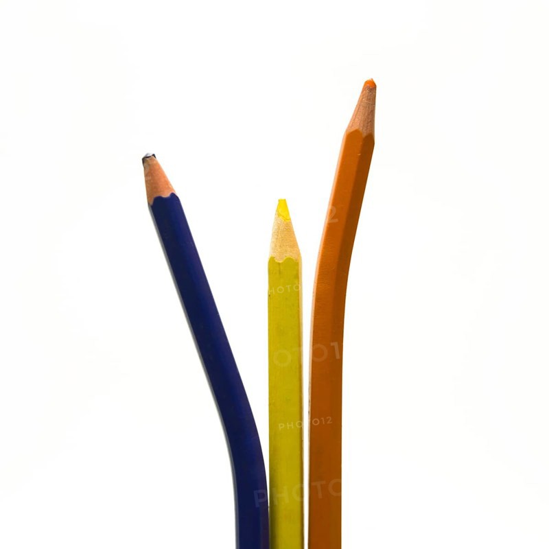Colored pencils on white background