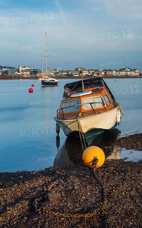 Long time exposure of boats in low tide