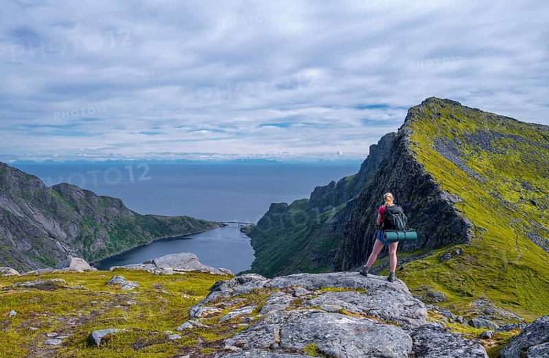 Hiker looks out over the Djupfjords