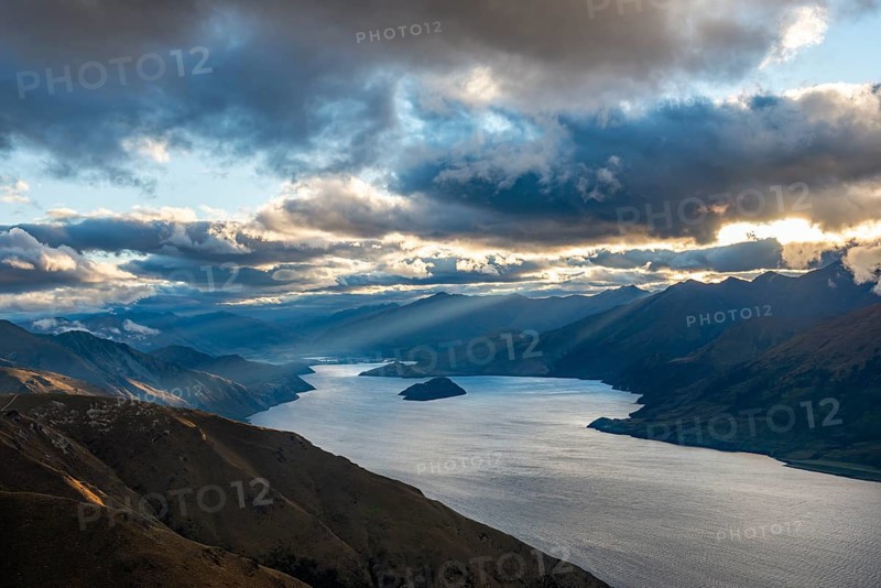 Sunbeams shining through cloudy sky